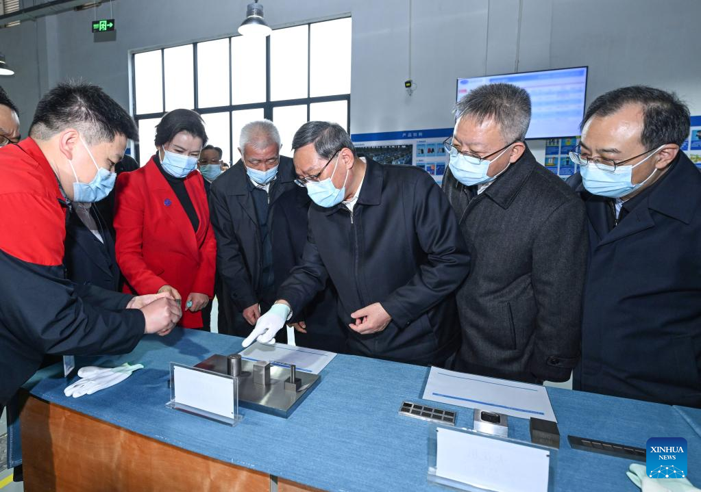 Chinese Premier Li Qiang, also a member of the Standing Committee of the Political Bureau of the Communist Party of China Central Committee, visits Lens Technology Co., Ltd. in Changsha, central China's Hunan Province, March 22, 2023. Li made an inspection tour and chaired a symposium on the development of the advanced manufacturing industry in central China's Hunan Province from Tuesday to Wednesday. (Xinhua/Rao Aimin)